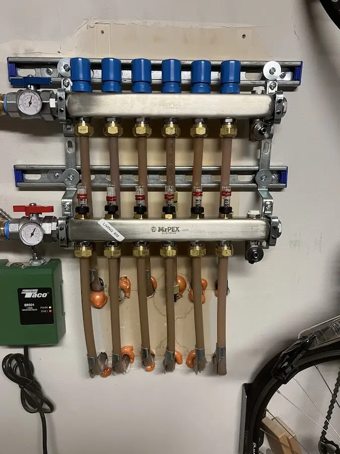 Plumber performing Water Heater Repair at a residential property in Perkasie